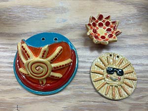 three examples of ceramic pieces students will make in art class