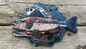 a photo of a Raku vase in brown and turquoise