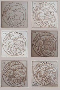 a leather tooled coaster in various stages of completion