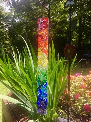 a glass-on-glass garden pendent in rainbow colors