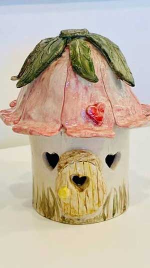 an example of a ceramic fairy house