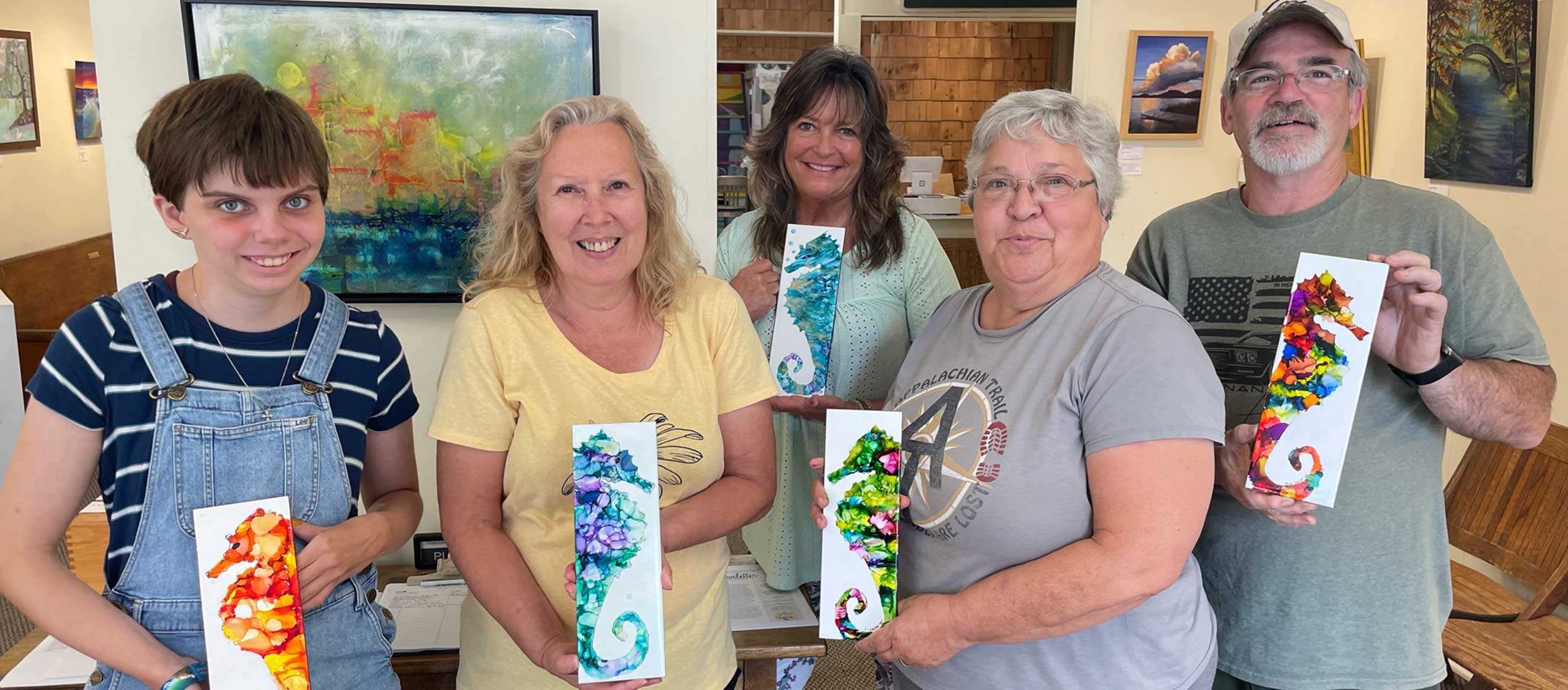 a photo of students and instructor from our arts center class on using alcohol ink