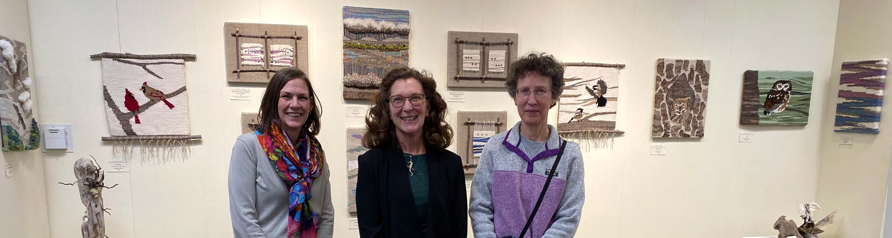 the three artists whose work is shown in the current show: Paintings, Weavings, and Wood
