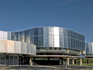 a photo of Corning Museum of Glass, where students will visit in January