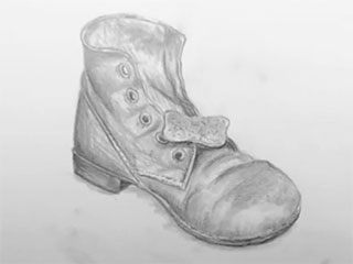 a drawing of an old shoe, which was done in the free drawing class
