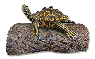 ceramic artwork of black knobed turtle